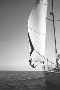 Fotografia Woman jumping from a yacht into the ocean, Mint Images