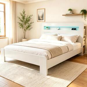 Letto imbottito 180x200 cm in legno bianco, con spazio contenitivo nella testiera, illuminazione a LED e prese elettriche integrate, ideale per la camera da letto