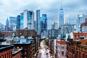 Fotografia Illuminated Manhattan Financial District skyscrapers seen, Alexander Spatari