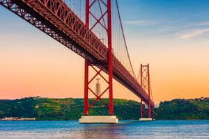 Fotografia 25th of April Bridge Lisbon Portugal at Sunset, © Allard Schager