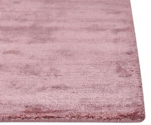 Tappeto in viscosa rosa 140 x 200 cm a pelo corto capitonné moderno Beliani