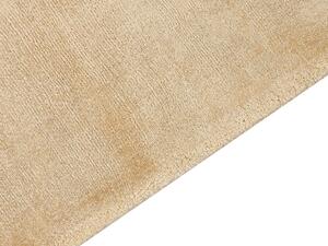 Tappeto in viscosa beige sabbia 160 x 230 cm a pelo corto capitonné moderno Beliani