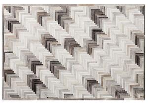 TaTappeto tappetino colore Grigio e beige 140 x 200 cm a pelo corto Pelle Bovina Patchwork Beliani