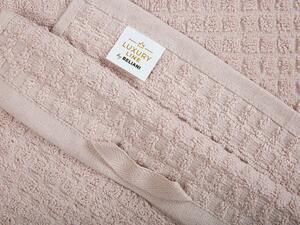 Set di 9 asciugamani da bagno e tappetino da bagno per ospiti in cotone rosa a bassa torsione Beliani