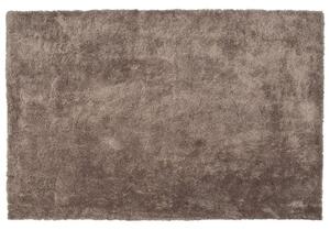 Tappeto Shaggy in cotone marrone chiaro in misto poliestere 140 x 200 cm soffice pelo denso Beliani