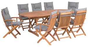 Set da pranzo per esterni in legno di acacia chiaro con cuscini grigi tavolo a 8 posti sedie pieghevoli design rustico Beliani