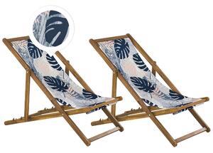Set di 2 sedie a sdraio da giardino con struttura in legno acacia chiaro motivo foglie di palma in tessuto amaca sedile reclinabile pieghevole Beliani