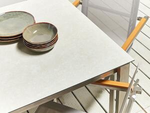 Tavolo da giardino Piano in vetro temperato bianco Struttura in acciaio inox Rettangolare 180 x 90 cm 6 posti a sedere Beliani