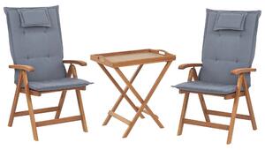Set da bistrot da giardino Tavolo in legno di acacia 2 sedie con cuscini blu resistente ai raggi UV pieghevole Beliani