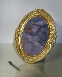 Portafoto in foglia oro ovale- misure: l.26 x h.32 x p.2