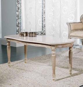 Tavolino shabby da salotto in legno intagliato con fregi