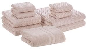 Set di 9 asciugamani da bagno e tappetino da bagno per ospiti in cotone rosa a bassa torsione Beliani