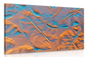 Quadro su tela – Texture di foglie sulla spiaggia di sabbia