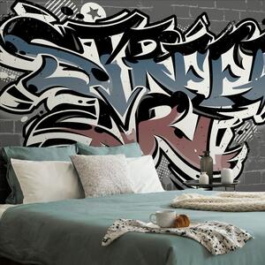 Carta da parati – Imitazione mattoni con scritta Street Art