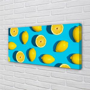 Quadro su tela Limoni su uno sfondo blu 100x50 cm