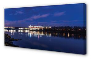 Quadro su tela Stadium notturno del ponte del fiume Varsavia 100x50 cm