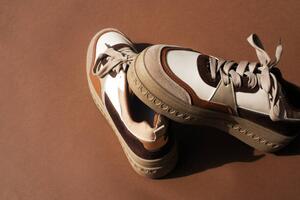 Fotografia Sneakers in brown tones on a, Maryna Terletska