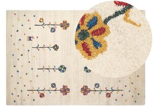 Tappeto di lana beige 140 x 200 cm realizzato a mano con motivo floreale stile tradizionale camera da letto soggiorno Beliani