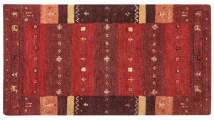 Tappeto Gabbeh rosso in lana con motivo natalizio fatto a mano 80 x 150 cm soggiorno camera da letto Beliani
