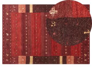 Tappeto rosso in lana con motivo natalizio fatto a mano 140 x 200 cm soggiorno camera da letto Beliani
