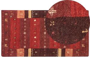 Tappeto rosso in lana con motivo natalizio fatto a mano 80 x 150 cm soggiorno camera da letto Beliani