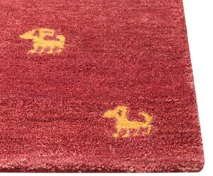 Tappeto Gabbeh di lana rossa fatto a mano con motivo animale 140 x 200 cm stile boho soggiorno camera da letto Beliani