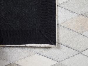 Tappeto Bianco e Nero in Pelle 160 x 230 cm Moderno Patchwork Fatto a Mano Beliani