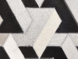 Tappeto tappetino Pelle Bovina Nera e Bianca 140 x 200 cm Motivo Geometrico Patchwork Beliani