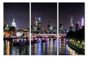 Quadro su tela Trittico sul fiume a Londra - una foto della città di notte con ponte