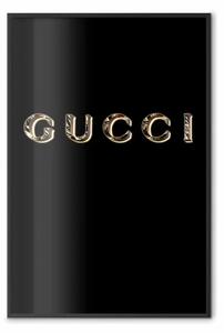 Poster: Gucci - scritta dorata in inglese su sfondo nero
