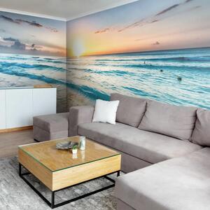 Carta da parati Tramonto sul mare - sole che cala sull’oceano mosso