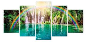 Quadro contemporaneo Arcobaleno sopra la cascata- acqua cristallina circondata da una vegetazione lussureggiante