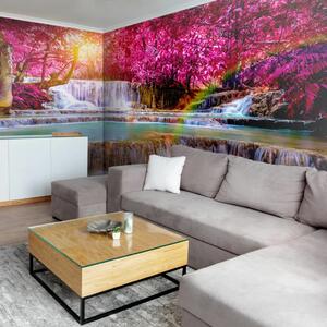 Carta da parati moderna Paradiso rosa - una cascata tra alberi tropicali dai colori intensi