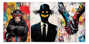 Quadro moderno Arte della ribellione - scimmia con controller di gioco e figura sorridente con mani