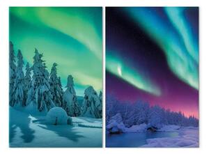 Quadro su tela Sonno invernale - aurora boreale colorata sopra una foresta innevata