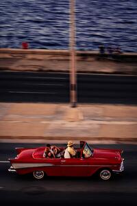 Fotografia Red Car Driving, Andreas Bauer