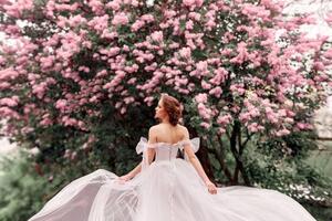 Fotografia artistica Spring Beauty Rear view of bride standing, MURAD PHOTOGRAPHY / 500px, (40 x 26.7 cm)