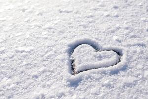 Fotografia artistica Small heart shape on snow with, Vitalii Petrushenko, (40 x 26.7 cm)