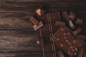 Fotografia artistica Chocolate bars with nuts and candies close-up, Olena Ruban, (40 x 26.7 cm)
