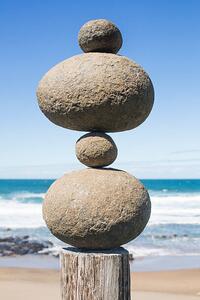 Fotografia artistica Tower of rocks balancing on a wooden pole, Dimitri Otis, (26.7 x 40 cm)