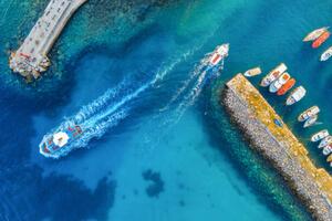 Fotografia Aerial view of colorful boats and, den-belitsky