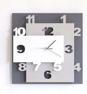 Orologio da parete composto da tre livelli I due pi� superficiali sono di forma rettangolare ZIGGURAT dimensioni 40x8x h 40 cm colore Fango Bianco e Sabbia