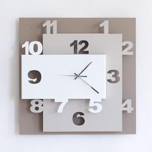 Orologio da parete composto da tre livelli. I due pi� superficiali sono di forma rettangolare ZIGGURAT dimensioni 40x8x h 40 cm colore Bianco Beige e Sabbia