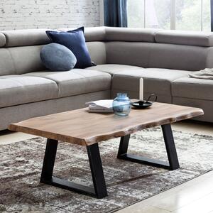 Tavolino FineBuy in legno massello di acacia, 115 cm. Tavolino rettangolare da salotto con bordo naturale e piedini in metallo nero. Tavolino di design realizzato a mano