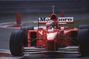 Fotografia Michael Schumacher in a Ferrari F310b at the Belgian Gp Spa Francorchamps Belgium 1997, (40 x 26.7 cm)