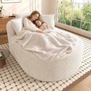 Poltrona relax ovale, dimensioni 170x112,5x83 cm, poltrona rivestita in tessuto color beige chiaro, monoblocco (non richiede montaggio), con profondità di seduta di 122 cm, ideale per il soggiorno