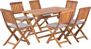 BELIANI Set da pranzo da giardino sedia pieghevole in legno di acacia con cuscini 6 posti 140 x 75 cm