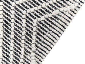 Tappeto in lana e cotone bianco e nero 160 x 230 cm, tessuto a mano a trama piatta con frange e motivo geometrico Beliani