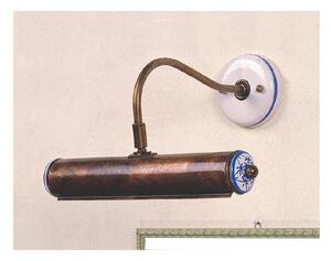 APPLIQUE RUSTICA SOPRA SPECCHIO O QUADRO IN OTTONE INVECCHIATO CON PARTICOLARI IN CERAMICA
