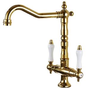 Rubinetto da cucina antico in oro con beccuccio girevole